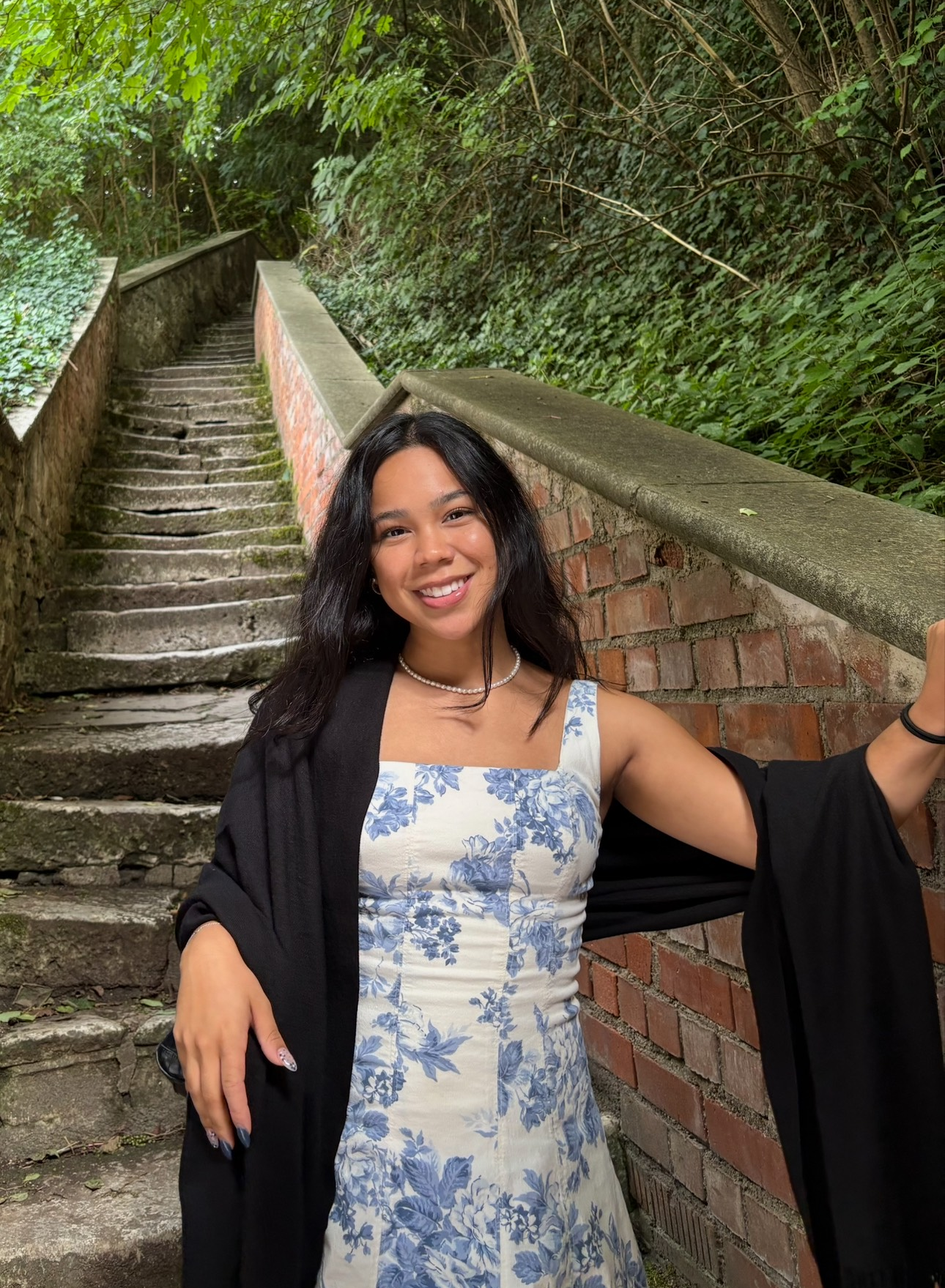 Rebecca posing on some stone steps